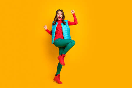 Full size photo of ecstatic positive cheerful girl travel trip win lottery raise fists scream yes...