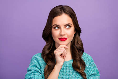 Closeup photo of pretty curly lady red lips good mood look dreamy up empty space hold arm on chin...