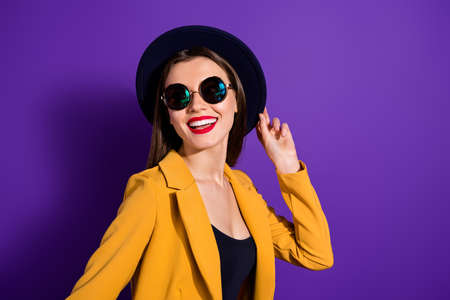 Portrait of cheerful girl enjoy rest relax with her friends touch velvet hat wear trendy vintage...