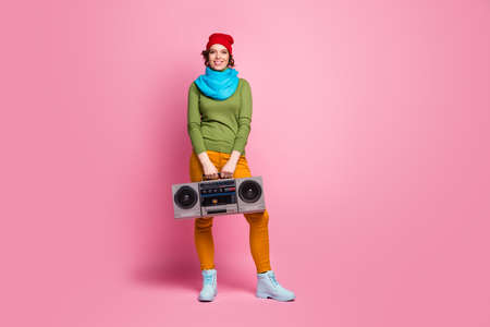 Full size photo of cheerful dreamy girl hold retro rhythm boom box enjoy weekend party wear blue red...