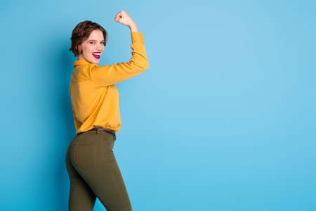 Profile photo of pretty lady hold raise biceps hand arm show perfect biceps gym training strong...
