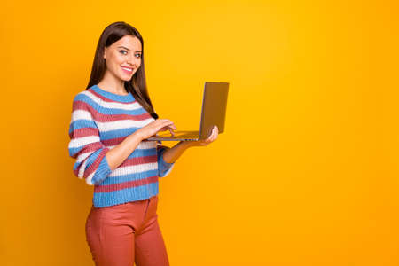 Portrait of her she nice attractive lovely cheerful cheery confident brown-haired girl holding in...