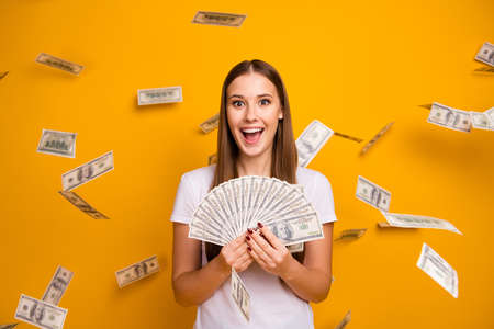 Astonished crazy girl student hipster hold money fan enjoy jackpot she get credit bank lottery usd...