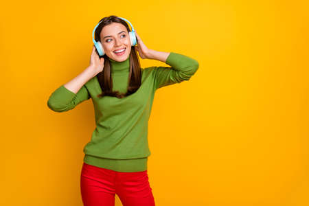 Photo of beautiful lady holding hands on ears vacation time listen youth music looking side empty...