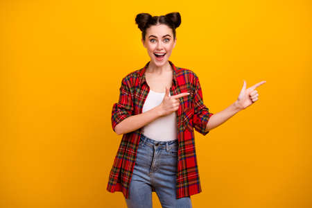 Portrait astonished crazy youngster girl point index finger copyspace impressed incredible ads promo...