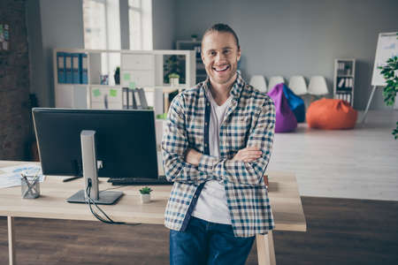 Photo of handsome business administrator guy leaning table arms crossed self-confident person...