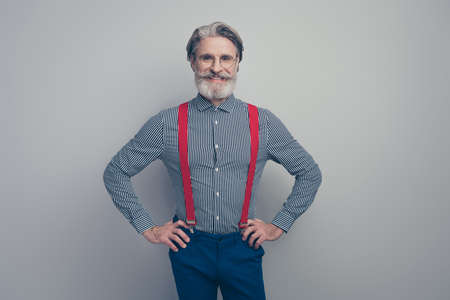 Portrait of his he nice attractive fashionable elegant classy chic content cheerful cheery man leader partner posing isolated over gray pastel color backgroundの写真素材