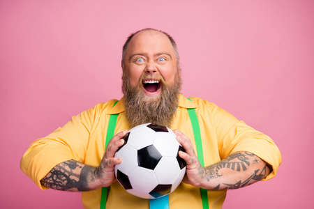 Close-up portrait of his he nice addicted crazy overjoyed cheerful cheery bearded guy holding in...