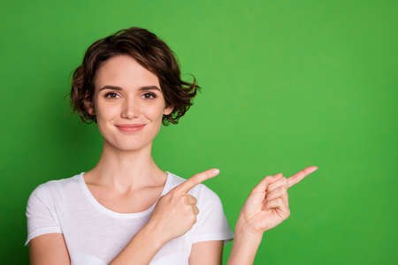Photo of attractive lady wavy hairdo direct fingers side empty space demonstrating cool shopping...