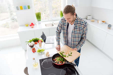 Top above high angle view photo of positive guy gourmet enjoy, cooking day weekend prepare tasty...