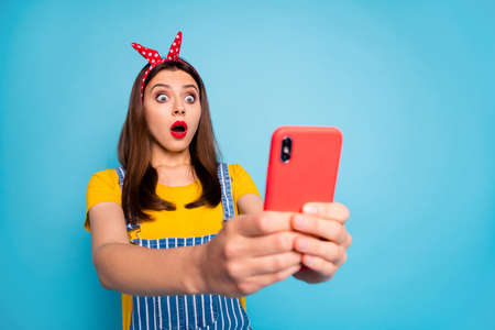 Portrait of her she nice attractive pretty glamorous cheerful amazed stunned glad girl using cell...