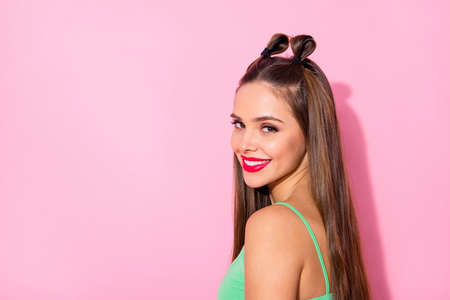 Profile photo of funky youngster lady toothy beaming smiling red bright lipstick good mood tanned bronze skin wear green crop top singlet isolated pastel pink color backgroundの写真素材