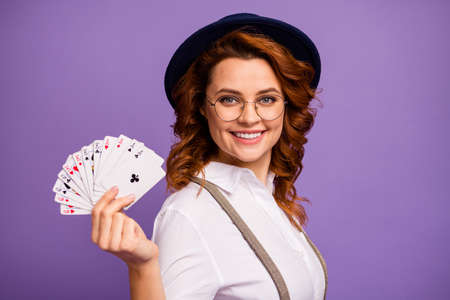 Photo of addicted player lady casino hold poker card deck winner illusionist club risky person wear...