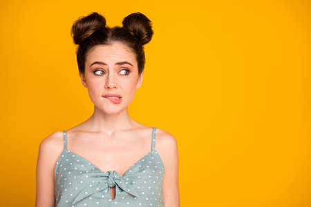 Portrait of frustrated despair girl look empty space feel nervous about her mistake wear good look clothes isolated over shine color backgroundの写真素材