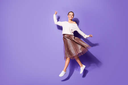 Full length body size view of her she nice attractive charming fashionable cheerful girl jumping...