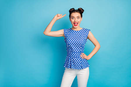 I like it. Photo of beautiful pretty funky lady indicating finger head cute hairstyle two buns wear...