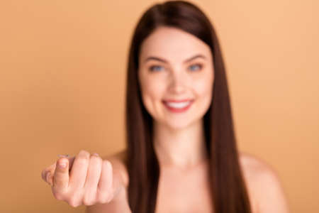 Close up photo of positive cheerful girl have bad eyesight go to doctor get perfect solution lens to cure astigmatism isolated over pastel color backgroundの写真素材