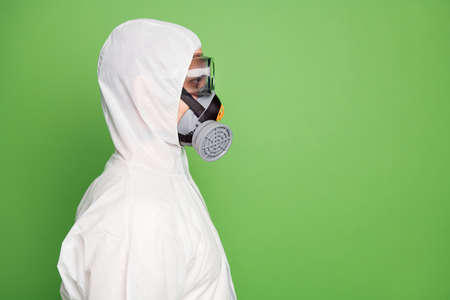 Close-up profile side view portrait of his he nice confident professional disinfectant wearing gas...
