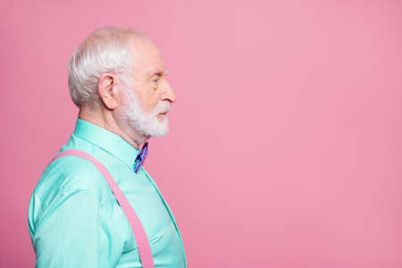 Profile photo of attractive grandpa looking empty space concentrated focused not smiling serious...