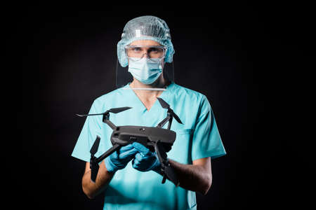 Photo of guy doc having fun hold remote controller digital airplane stay home favorite hobby wear...