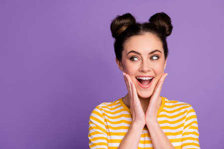 Close-up portrait of nice-looking attractive pretty lovely lovable cute cheerful cheery amazed brown-girl good news reaction isolated on bright vivid shine vibrant lilac violet purple color backgroundの写真素材