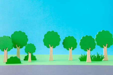 Art design picture of nice green ecological plants near highway organic park isolated over bright vivid shine vibrant blue color backgroundの写真素材