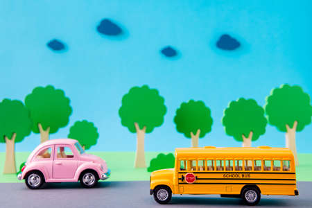Art design picture of nice retro vintage car schoolbus moving riding on highway carrying people...
