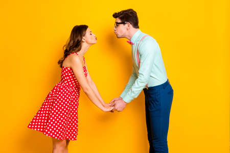 Profile photo of pretty lady handsome guy prom party couple photographing hold arms kissing eyes...