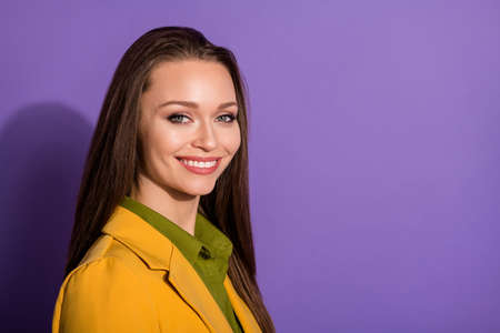 Closeup photo of confident beautiful business lady smiling bossy successful cheerful worker wear yellow office blazer suit green blouse shirt isolated purple pastel color backgroundの写真素材
