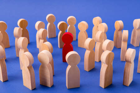 Crowd of wooden figures people walking strolling in big city. One special guy talented businessman...
