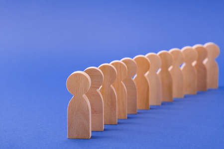 Line of many faceless people figures similar same social layer expecting money subsidy donation help...