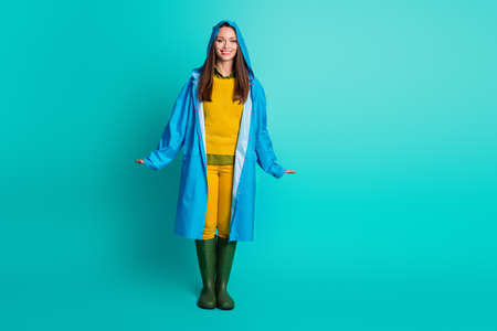 Full length photo of attractive lady beaming smile cheerful charming look rainyの写真素材