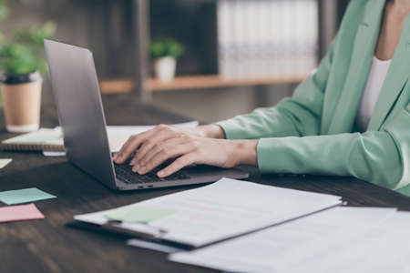 Cropped profile closeup photo of business lady hands chatting notebook table colleagues corporate...