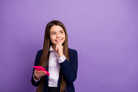 long-haired girl using cell thinking copy space creating strategy smm isolated bright vivid shine...