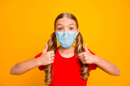 pretty girl wearing gauze safety mask showing double thumbup prevention healthy life recovery ...