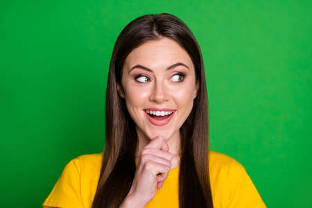 Portrait of energetic candid crazy funny youth girl touch chin finger look copyspace think thoughts...
