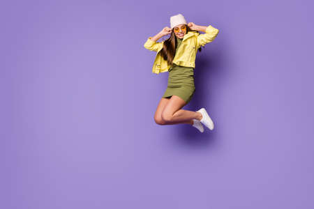 Full length body size view of her she nice attractive pretty fashionable cheerful girl jumping...