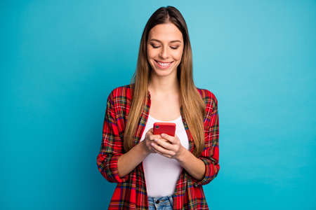 Portrait of her she nice attractive lovely focused cheerful cheery long-haired girl wearing checked...
