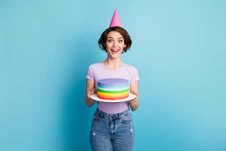 Portrait of astonished positive cheerful girl impressed friend party birthday preparation hold cake...