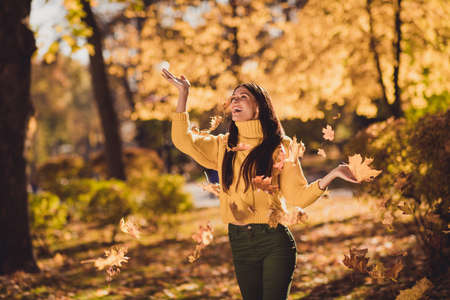 Photo of positive cheerful girl countryside tourist enjoy autumn rest relax holiday in park woods...