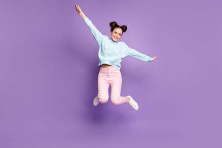 Full length body size view of nice attractive pretty slim fit cheerful careless girl jumping flying...