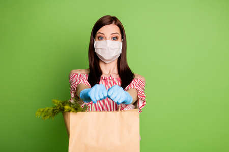 Photo girl deliver consumer customer paper bag fresh grocery market herbs self-isolation concept...
