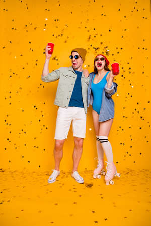 Vertical full length body size view of his he her she nice attractive cheerful glad couple friends...