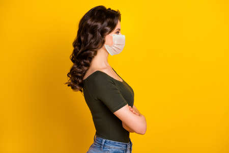 Profile side view portrait of her she attractive healthy wavy-haired girl folded arms wear safety...