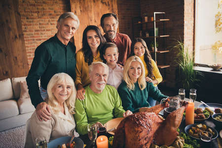Portrait of nice attractive cheerful cheery careful family grandparents parents grandchildren...