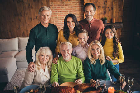 Portrait of nice attractive cheerful adorable family grandparents parents meeting spending festal...