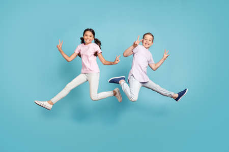 Full length body size view of two attractive small little cheerful best buddy fellow friends...