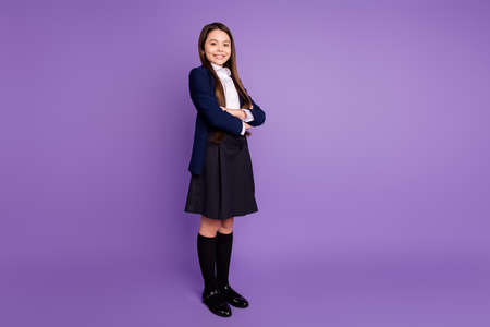 Full length body size profile side view of her she nice attractive pretty cheerful content schoolchild folded arms back to school new season isolated violet lilac purple pastel color backgroundの写真素材