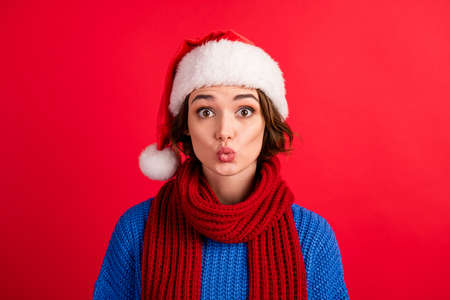 Close up photo of surprised girl in santa claus headwear impressed christmas season shopping jolly...