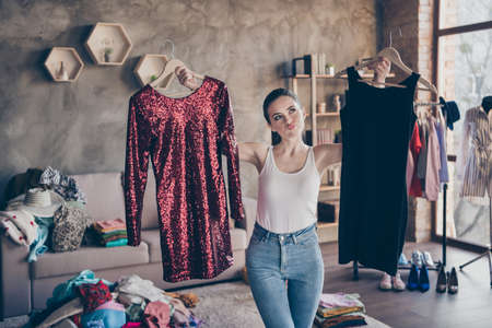 view of   girl choosing  dressの写真素材